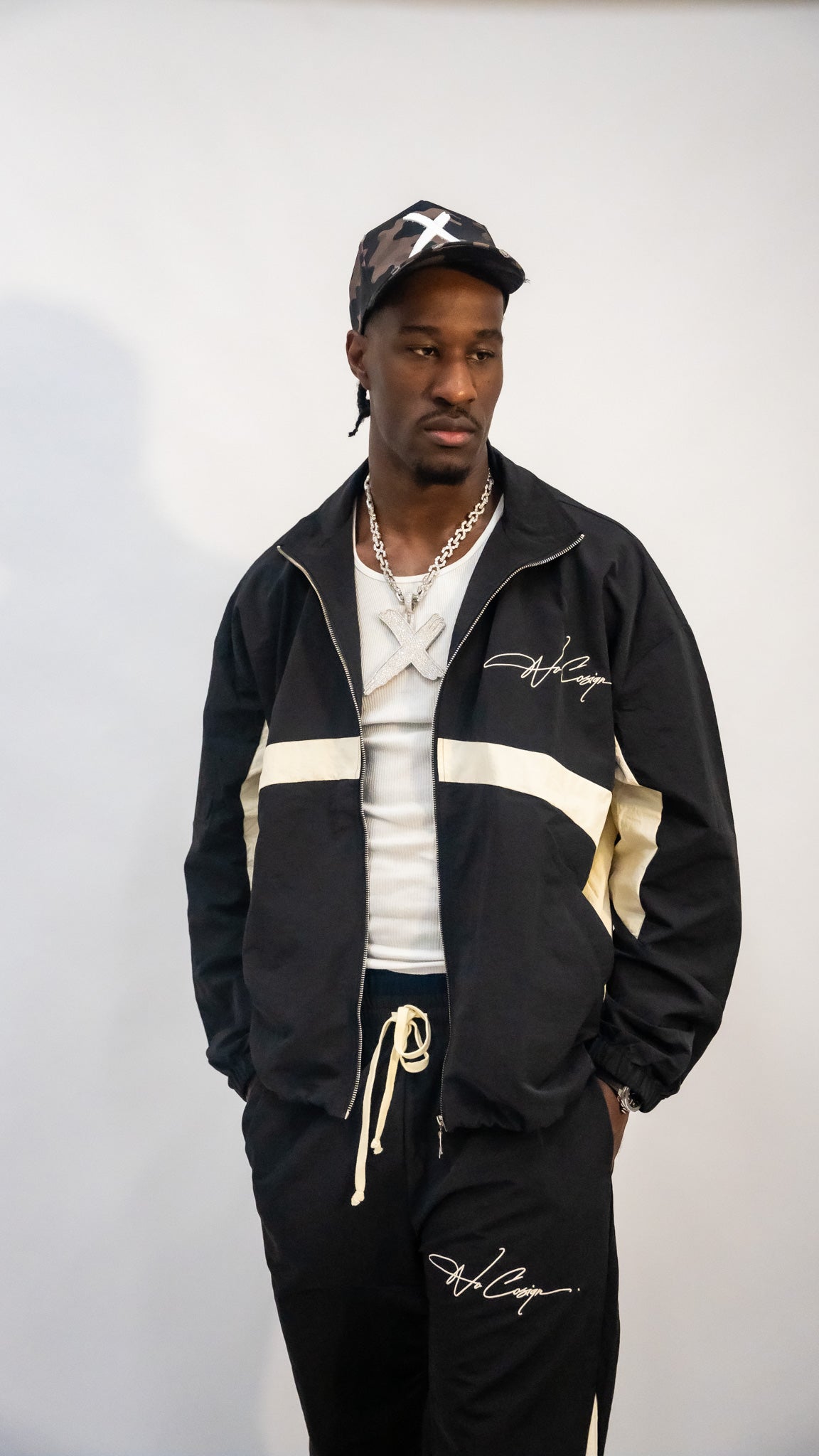 Windbreaker track pants black+cream
